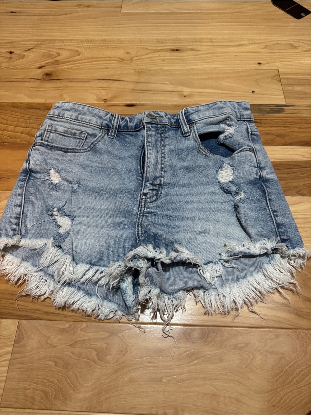 Light Wash Distressed Denim Shorts - Women's
